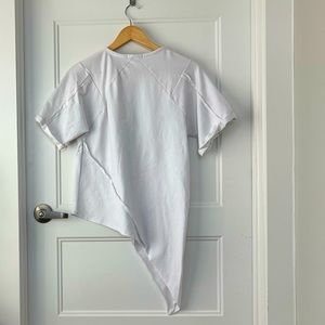 Unique white asymmetric hem shirt